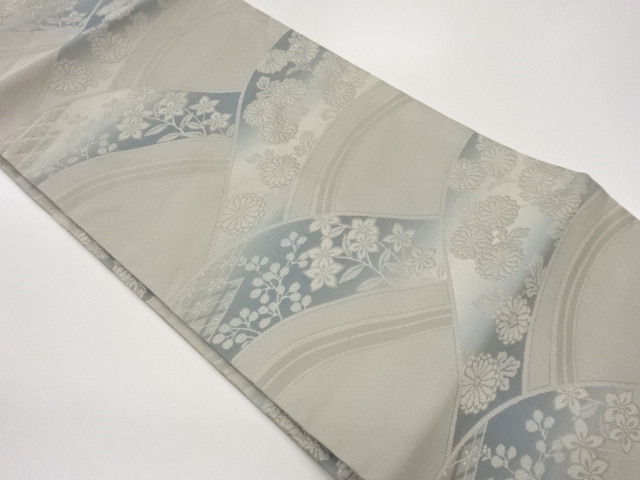 曲線に秋草・菱模様織出し名古屋帯